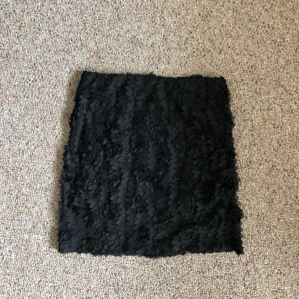 Black floral appliqué mini skirt